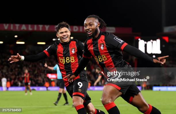 Bou24celebrates scoring his team's third goal with teammate Evanilson during the Premier League match between AFC Bournemouth and Southampton FC at...