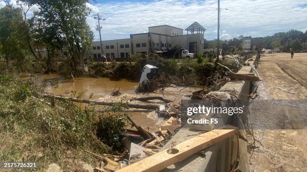 submerged van in the swannanoa river near biltmore village after hurricane helene in asheville, nc - hurricane stock pictures, royalty-free photos & images