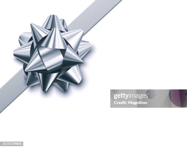 glossy silver bow with ribbon, tied at an angle, vector illustration - white bow stock illustrations