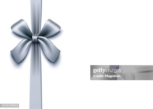 vertical glossy silver bow with ribbon, vector illustration - overhead multiple devices stock illustrations