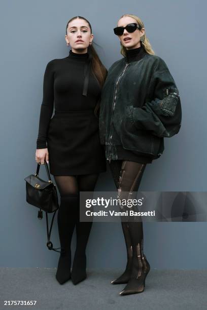 Rachel Sennott and Emma Roberts attend the Balenciaga Paris Womenswear Spring-Summer 2025 show as part of Paris Fashion Week on September 30, 2024 in...