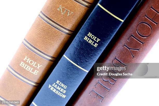 stack of bible books - fundamentalism stock pictures, royalty-free photos & images
