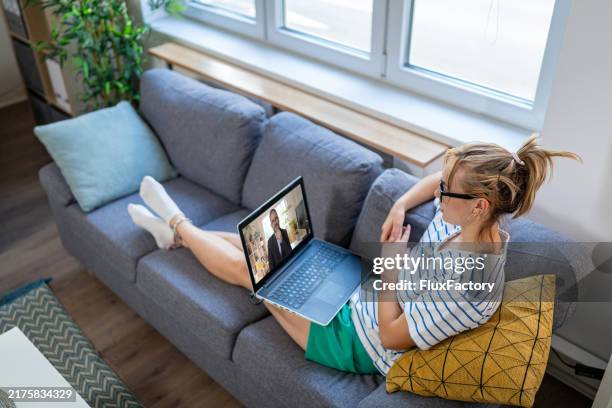 active distance therapy session: a young girl communicates with her therapist in a relaxed atmosphere. - online therapy stock pictures, royalty-free photos & images