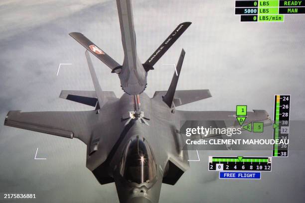 This photograph taken aboard a French Air Force Airbus A330 MRTT , over Greek territorial waters, October 4, 2024 shows the control screen of a...