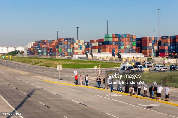 In an aerial view, dockworkers strike outside of the Port of Houston Authority on October 01, 2024 in Houston, Texas. Members of the International...