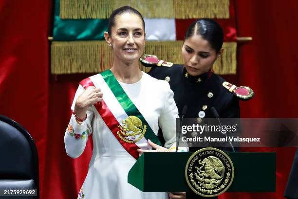 New president of Mexico Claudia Sheinbaum Pardo receives the presidential sash during the investiture ceremony as part of the presidential...