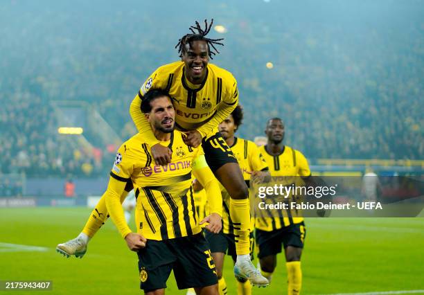 Emre Can of Borussia Dortmund celebrates scoring his team's first goal with teammate Jamie Bynoe-Gittens during the UEFA Champions League 2024/25...