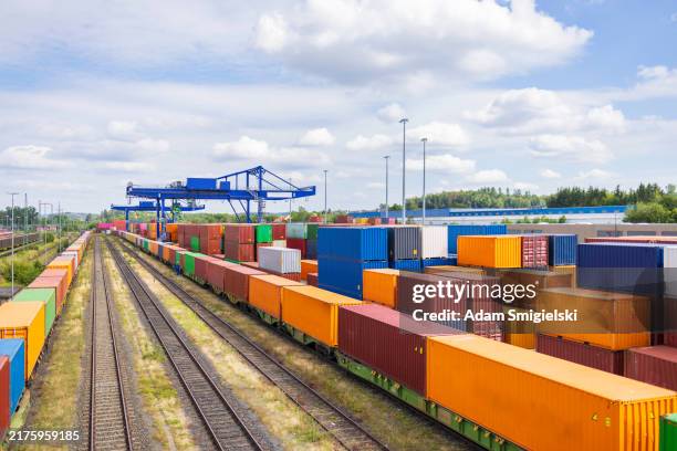 cargo containers at freight terminal - transporte ferroviário imagens e fotografias de stock