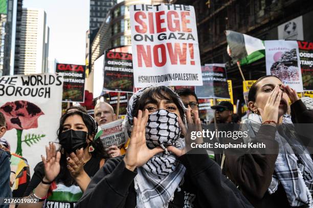 Pro-Palestinian protesters rally in support of Gaza and Lebanon in Times Square on October 5, 2024 in New York City. Protesters are ramping up their...