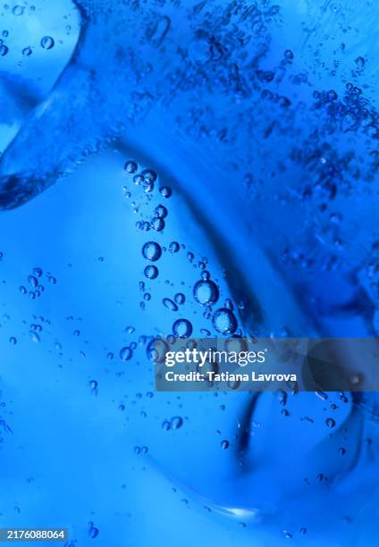 clear blue shower gel, soap texture close up. natural cosmetics background. - shower gel stock pictures, royalty-free photos & images