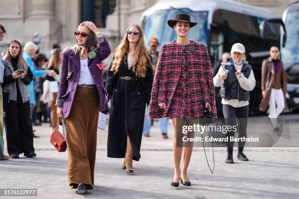 Guest wears dark brown sunglasses, dark gray head scarf, white tank top, dark purple black pattern tweed multi color pocket oversized blazer jacket,...