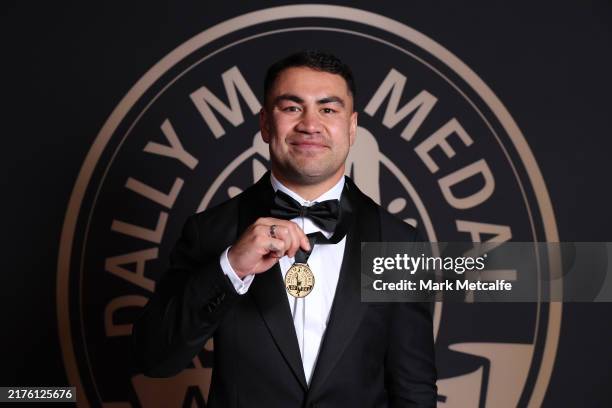 Dally M medallist Jahrome Hughes of the Storm poses during the 2024 Dally M Awards at Royal Randwick Racecourse on October 02, 2024 in Sydney,...