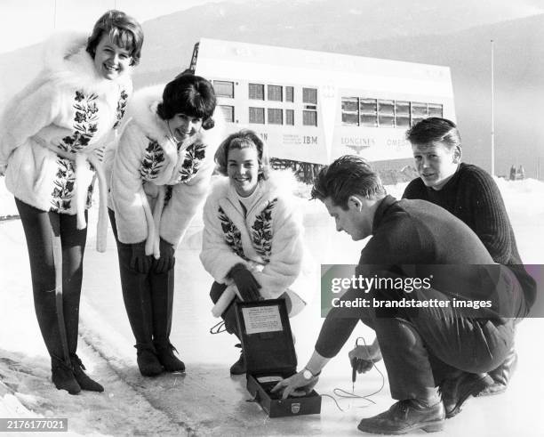 Ice figure skating. Canadian figure skaters from left Shirra Kenworthy - Petra Burka - Wendy Griner with ice measuring instrument, 1964 Winter...