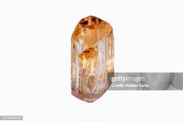 rough imperial topaz - gemstone stock pictures, royalty-free photos & images
