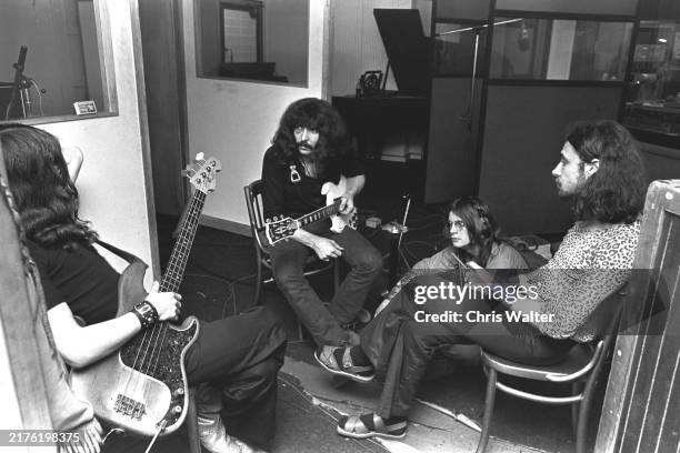 British rock band Black Sabbath Geezer Butler, Tony Iommi, Ozzy Osbourne and Bill Ward at Regents Sounds during Paranoid sessions on June 17, 1970 in...