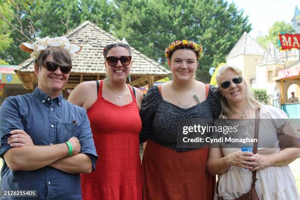 family enjoying the day at an autumn renaissance festival. dressed up for a day in the woods. - travels with my aunt stock pictures, royalty-free photos & images
