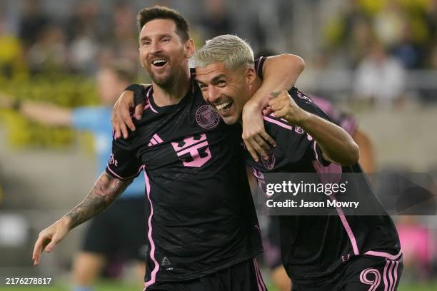 Lionel Messi and Luis Suarez of Inter Miami CF celebrate a goal during the second half against the Columbus Crew at Lower.com Field on October 02,...