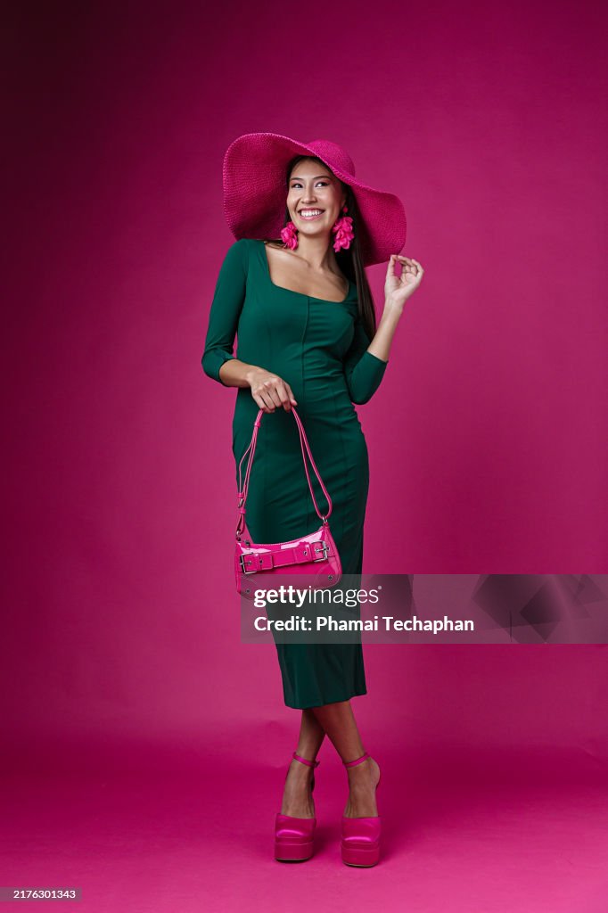 Beautiful woman wearing green dress