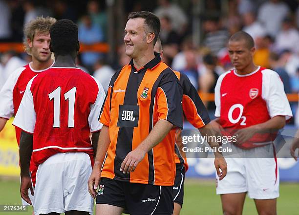 Steve Pankhurst smiles as he participates in the pre-season Friendly match between Barnet and Arsenal at Underhill Stadium July 19, 2003 in London....