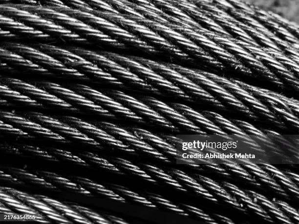 industrial wire rope - metal cable texture stock pictures, royalty-free photos & images