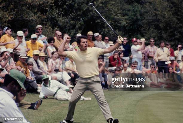 Italian golfer Roberto Bernardini raises his arms in celebration after sinking a birdie putt on the fourth hole during the third round of the US...