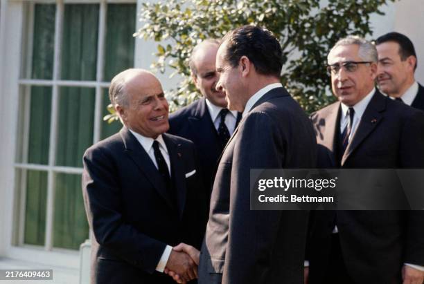 President Richard Nixon shaking hands with Tunisian President Habib Bourguiba following a meeting at the White House in Washington, April 1st....
