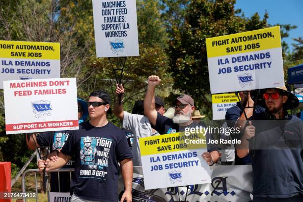Port Everglades dockworkers continue their picket near the entrance to the port three days after the union and management failed to reach a consensus...