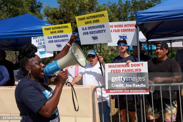 Port Everglades dockworkers continue their picket near the entrance to the port three days after the union and management failed to reach a consensus...