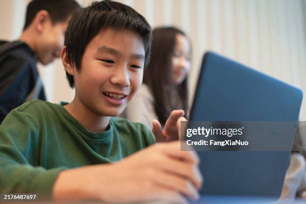 Computer Student Using Asian 2,195 Asian Kids Coding Stock Photos, High-Res Pictures, and Images ...
