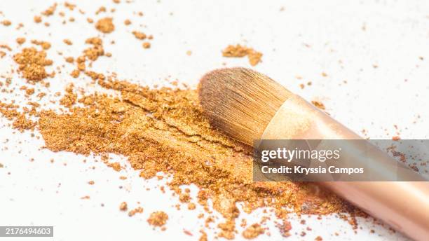 makeup brush with shimmering powder - make up brush stock pictures, royalty-free photos & images
