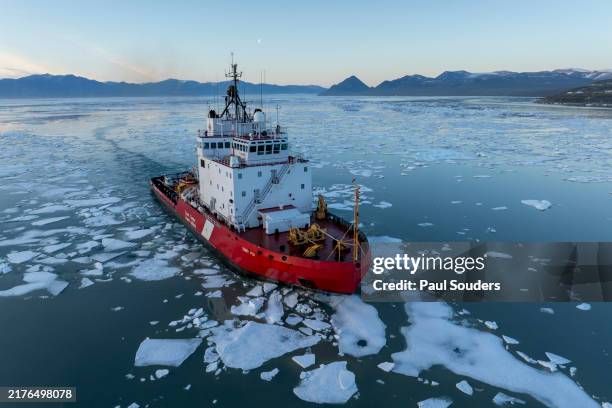 aerial view of canadian ice breaker in sea ice, baffin island, nunavut, canada - arctic stock pictures, royalty-free photos & images