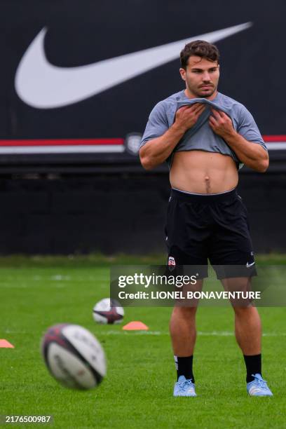 Stade Toulousain's French scrum-half and Olympic rugby sevens gold medallist Antoine Dupont trains with teammates during a training session at the...