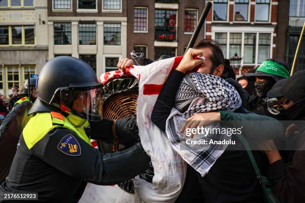 Police and protestors clash during demonstration in support of Palestinian people and protest against Israeli attacks on Gaza to mark its first...