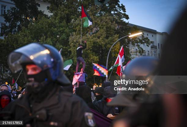 Police officers take security measures as pro-Palestinian demonstrators gather near the Sudstern metro station to support of Palestinian people and...