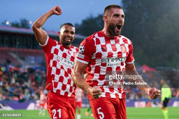 David Lopez of Girona FC celebrates scoring his team's first goal during the UEFA Champions League 2024/25 League Phase MD2 match between Girona FC...