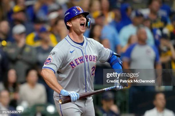 Pete Alonso of the New York Mets celebrates after hitting a home run in the ninth inning against the Milwaukee Brewers during Game Three of the Wild...