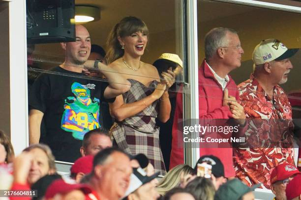 Taylor Swift cheers from a suite as the Kansas City Chiefs play the New Orleans Saints during the first half of an NFL football game at GEHA Field at...