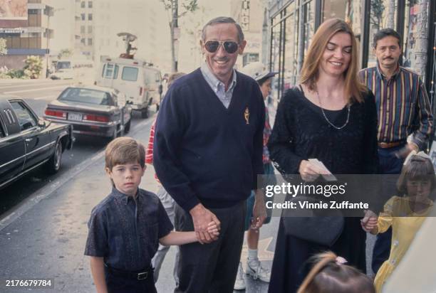 American businessman Roy Disney and his grandson attending the premiere of 'Aladdin' at the El Capitan Theater in Hollywood, California, November 8th...