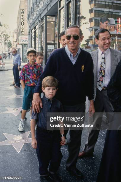 American businessman Roy Disney and his grandson attending the premiere of 'Aladdin' at the El Capitan Theater in Hollywood, California, November 8th...