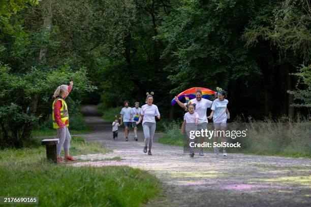 pride run fun - running paint stock pictures, royalty-free photos & images
