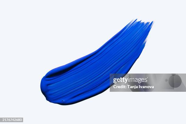 textured blue stroke of the paint brush on white background - nail varnish stock pictures, royalty-free photos & images