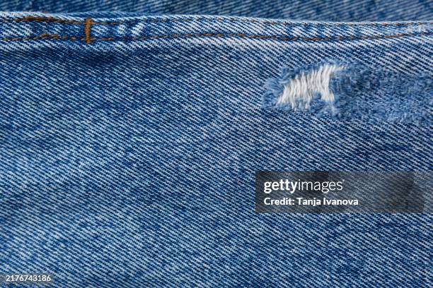 background of blue jeans fabric denim texture - seam stock pictures, royalty-free photos & images