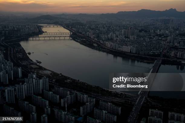 The Han River at dusk in Seoul, South Korea, on Saturday, Oct. 5, 2024. Seoul's housing market showed more signs of cooling last month, with...