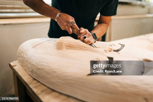 indigenous alaskan artist working on traditional wood masks - carving stock pictures, royalty-free photos & images
