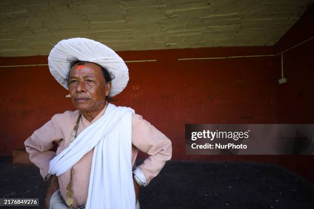 Priest rests in a public rest-house ahead of the Shikali festival celebration in Khokana, Lalitpur, Nepal, on October 8, 2024. During this five-day...