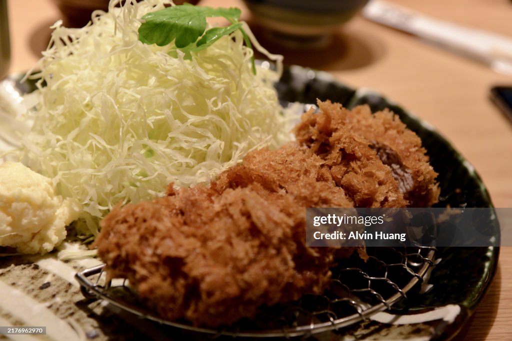 Tonkatsu
Japanese pork cutlet
Rice served separately
Crispy breaded pork
Shredded cabbage
Tonkatsu sauce
Japanese cuisine
Traditional meal