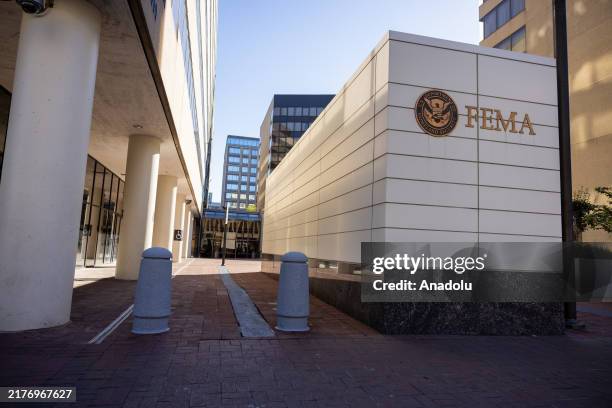 Signage for the Federal Emergency Management Agency is seen outside of the agency's headquarters in Washington, DC on October 9, 2024.
