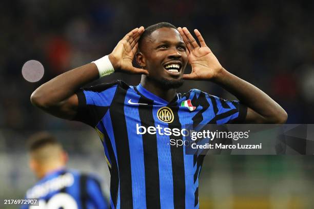 Marcus Thuram of FC Internazionale celebrates scoring his team's first goal during the Serie A match between FC Internazionale and Torino at Stadio...