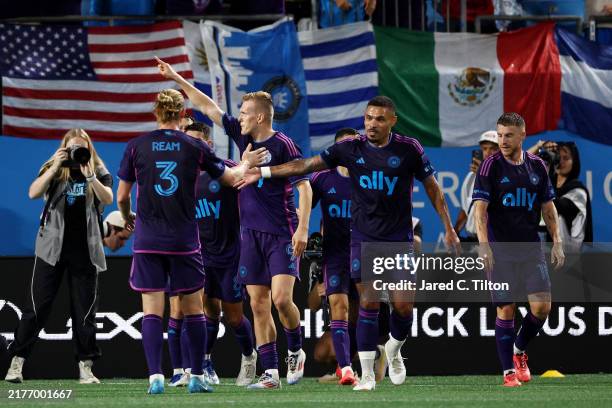 Karol Świderski of Charlotte FC reacts with his team following a goal during the first half of the game against the CF Montréal at Bank of America...
