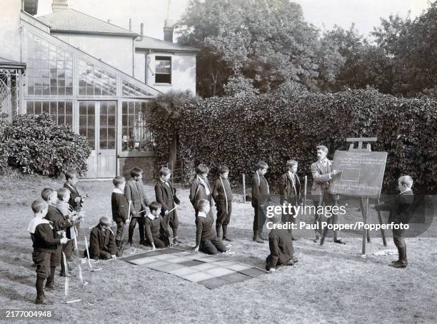 Boys' outdoor lesson in arithmetic at Birley House Open-Air School, Forest Hill, London, circa 1908.